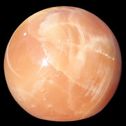 Honey Calcite sphere 48mm 175g in sunshine - Rocks and Things Store