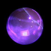 Honey Calcite sphere 48mm 175g in UV light  - Rocks and Things Store