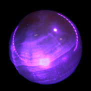 Honey Calcite sphere 48mm 175g in UV light  - Rocks and Things Store