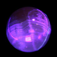 Honey Calcite sphere 48mm 175g in UV light  - Rocks and Things Store