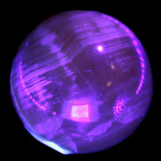 Honey Calcite sphere 48mm 175g in UV light  - Rocks and Things Store