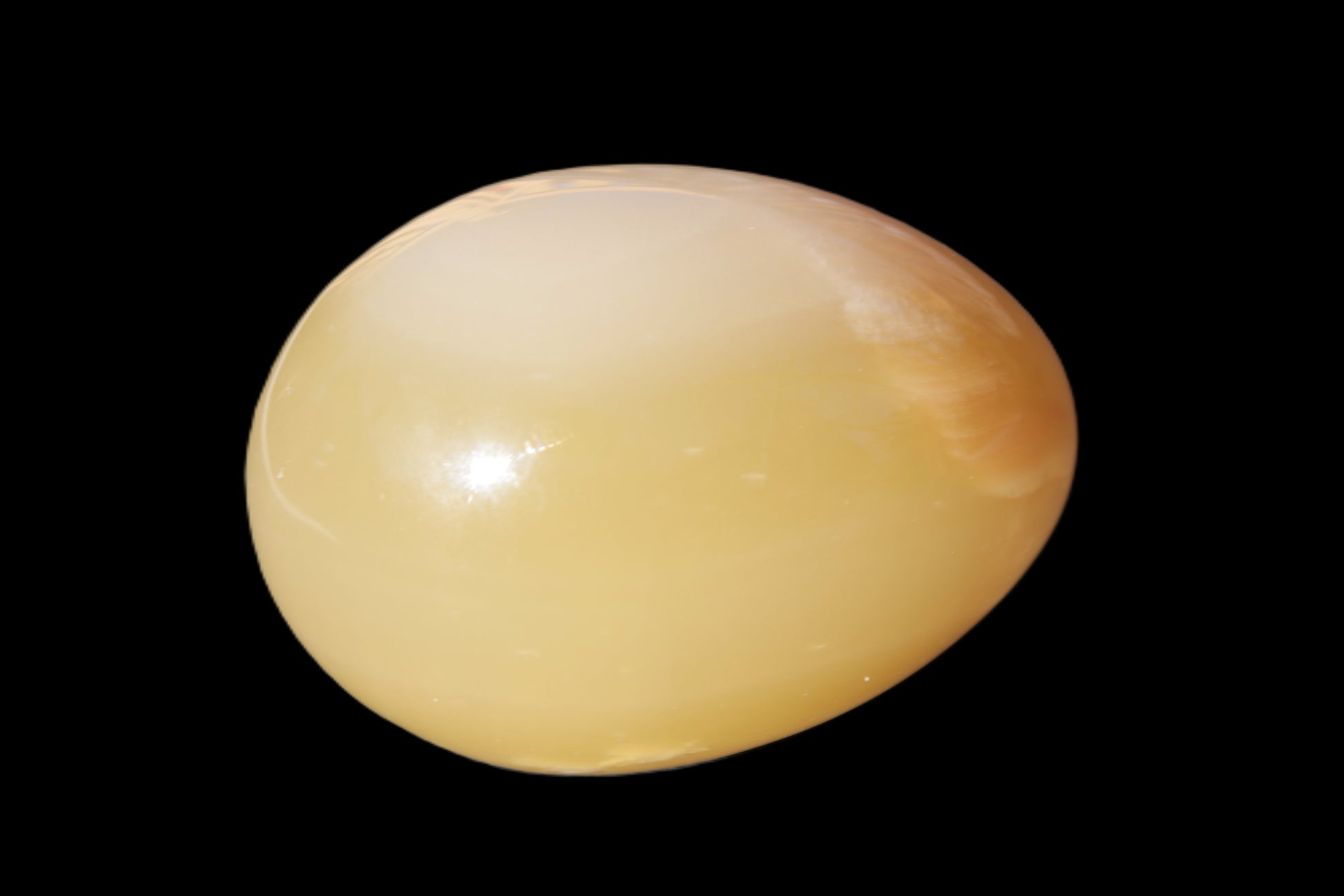 Honey Calcite Egg 47*72mm 252.4g Rocks and Things