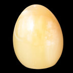Honey Calcite Egg 47*72mm 252.4g in sunlight - Rocks and Things Store