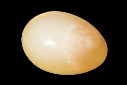 Honey Calcite Egg 47*72mm 252.4g Rocks and Things