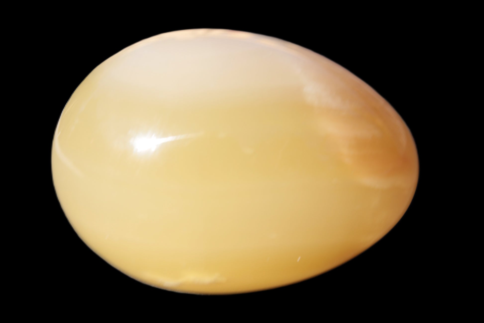 Honey Calcite Egg 47*72mm 252.4g Rocks and Things