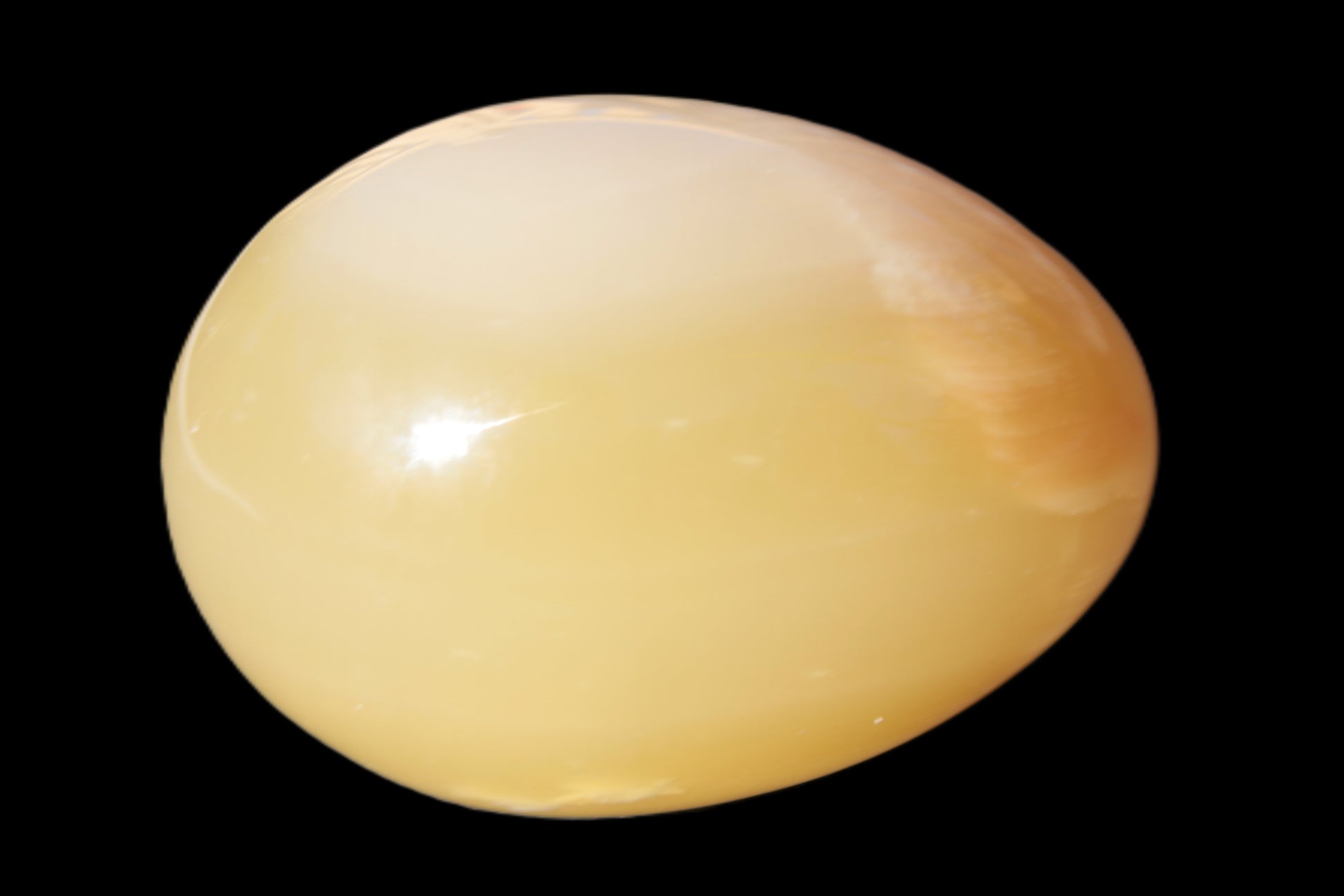 Honey Calcite Egg 47*72mm 252.4g Rocks and Things