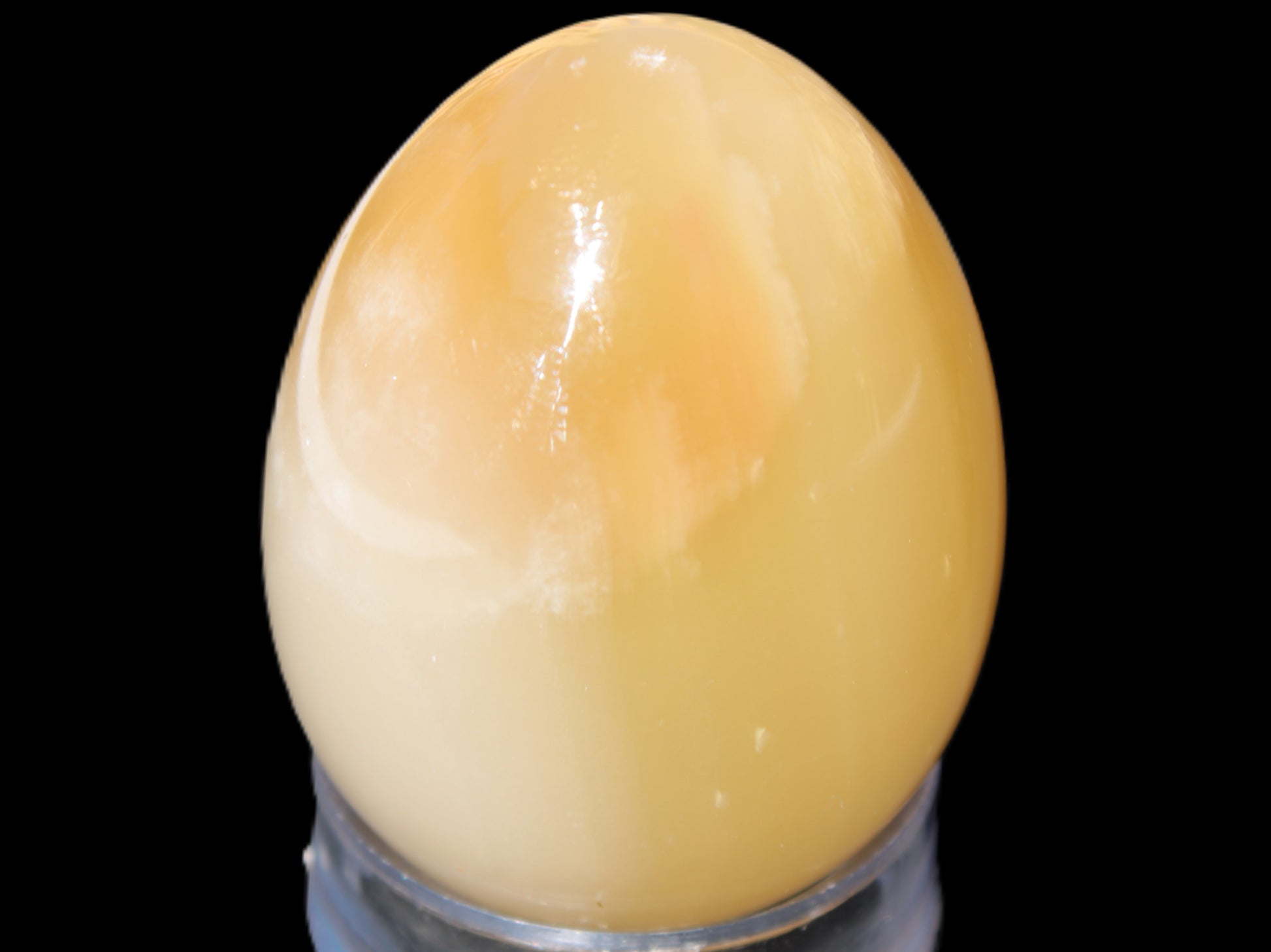 Honey Calcite Egg 47*72mm 252.4g Rocks and Things