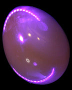 Honey Calcite Egg 47*72mm 252.4g in UV light - Rocks and Things Store