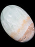 Pistachio Calcite palmstone 64-72mm  121-168g in sunshine - Rocks and Things Store