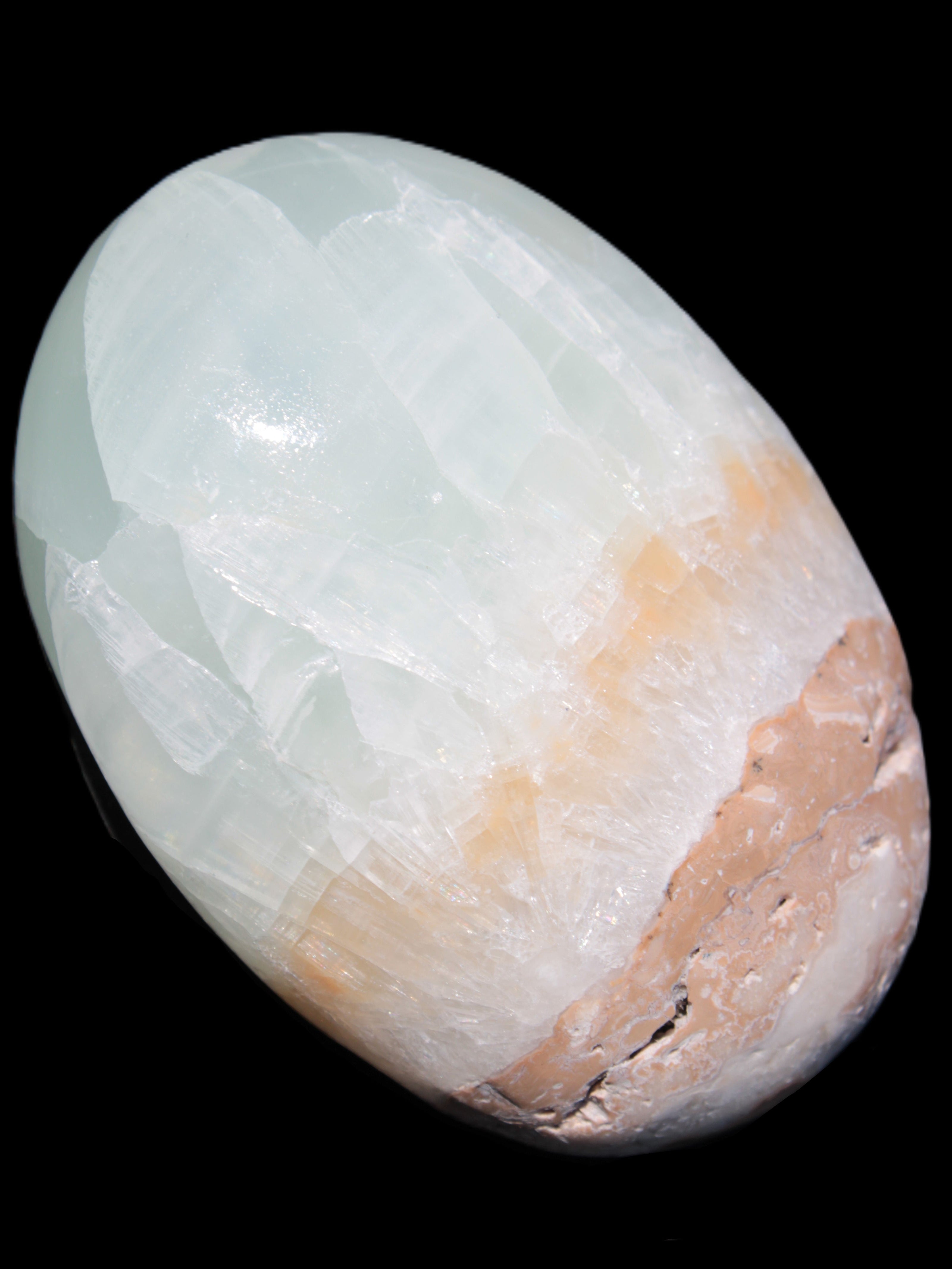 Pistachio Calcite palmstone 64-72mm  121-168g in sunshine - Rocks and Things Store