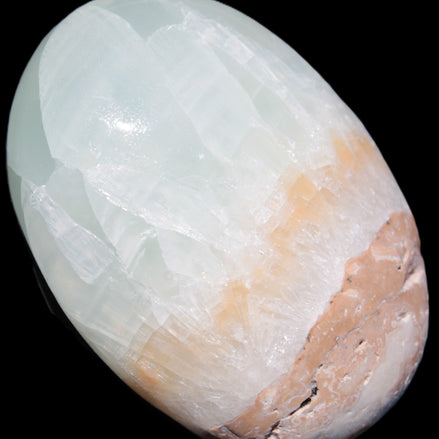 Pistachio Calcite palmstone 64-72mm  121-168g in sunshine - Rocks and Things Store