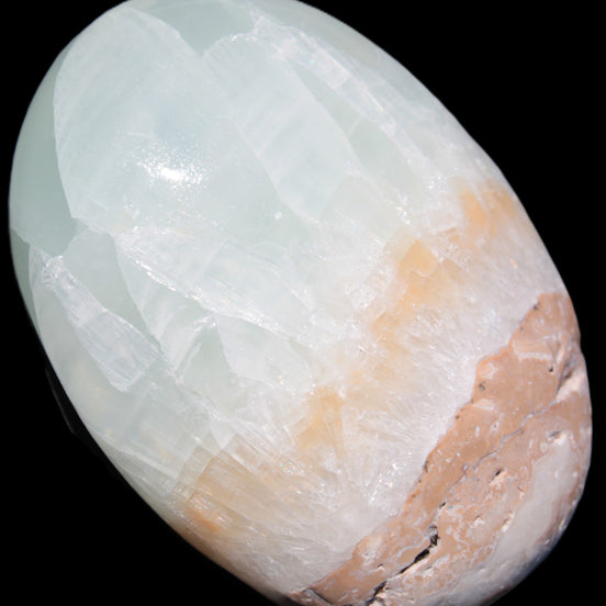 Pistachio Calcite palmstone 64-72mm  121-168g in sunshine - Rocks and Things Store
