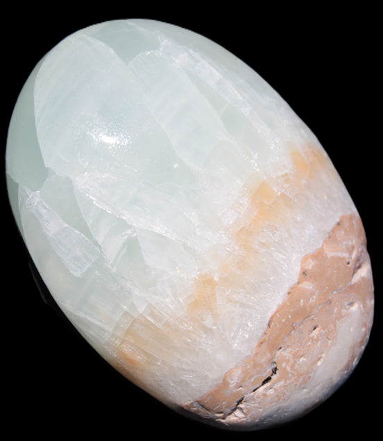 Pistachio Calcite palmstone 64-72mm  121-168g in sunshine - Rocks and Things Store