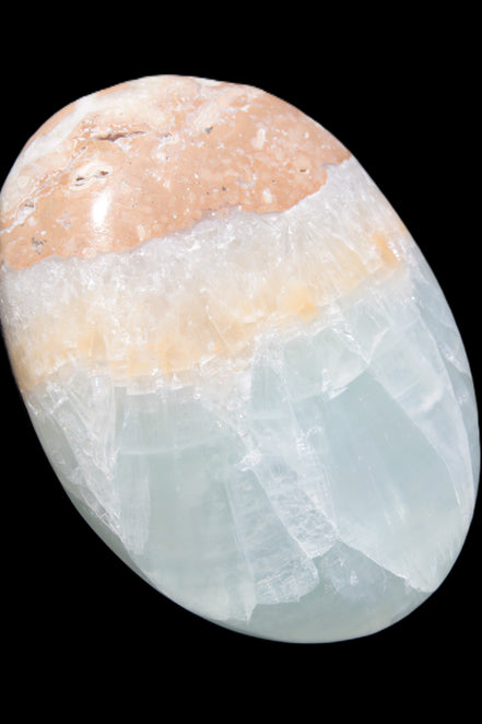Pistachio Calcite palmstone 64-72mm  121-168g in sunshine - Rocks and Things Store