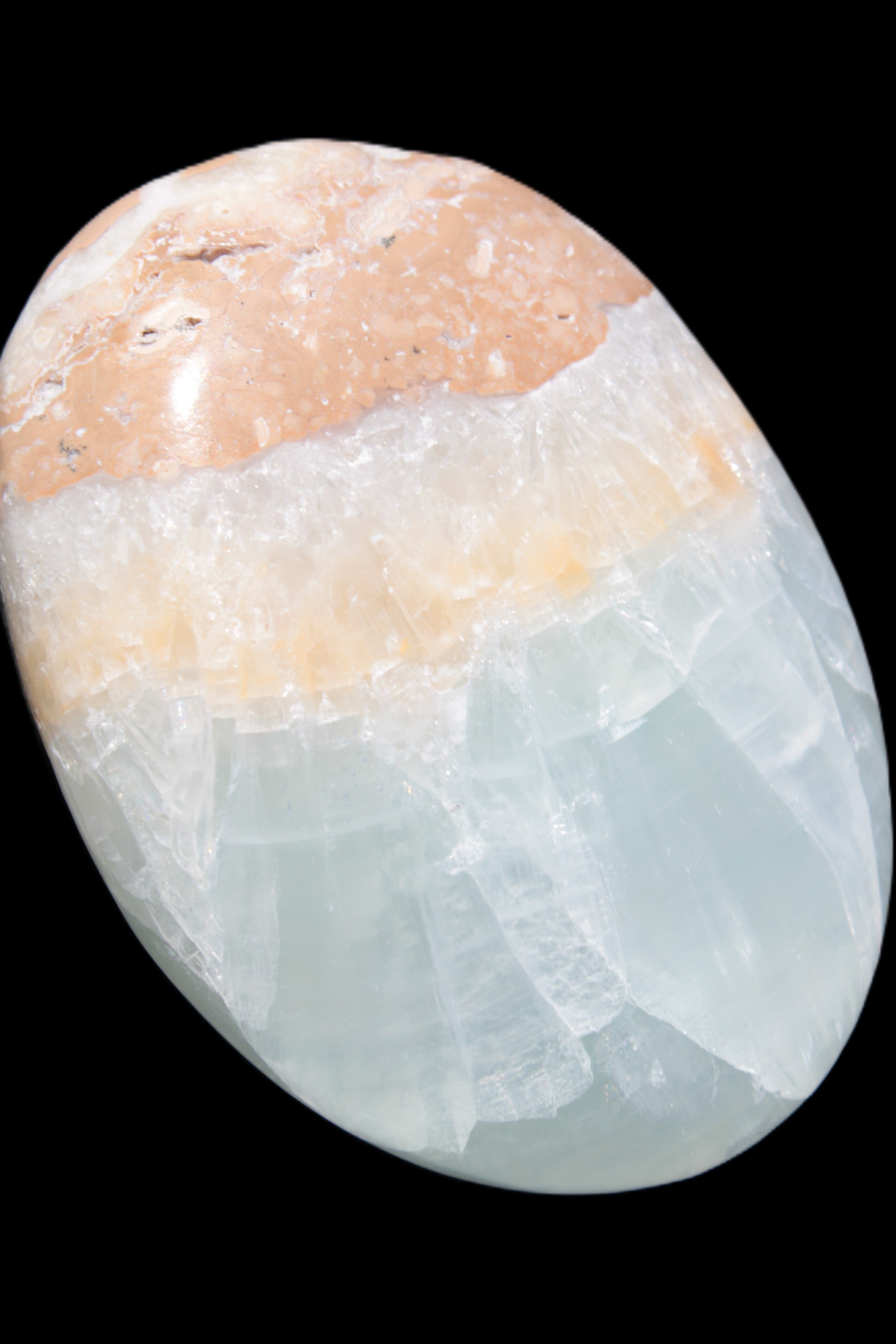 Pistachio Calcite palmstone 64-72mm  121-168g in sunshine - Rocks and Things Store