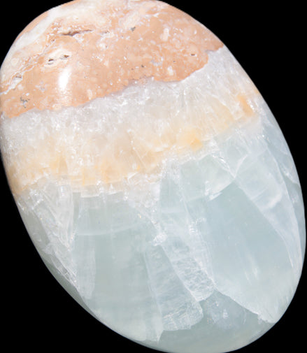 Pistachio Calcite palmstone 64-72mm  121-168g in sunshine - Rocks and Things Store