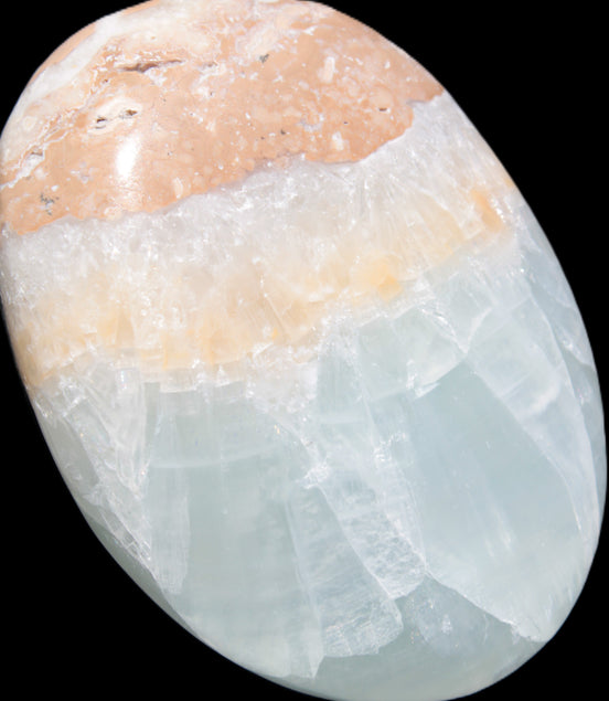 Pistachio Calcite palmstone 64-72mm  121-168g in sunshine - Rocks and Things Store