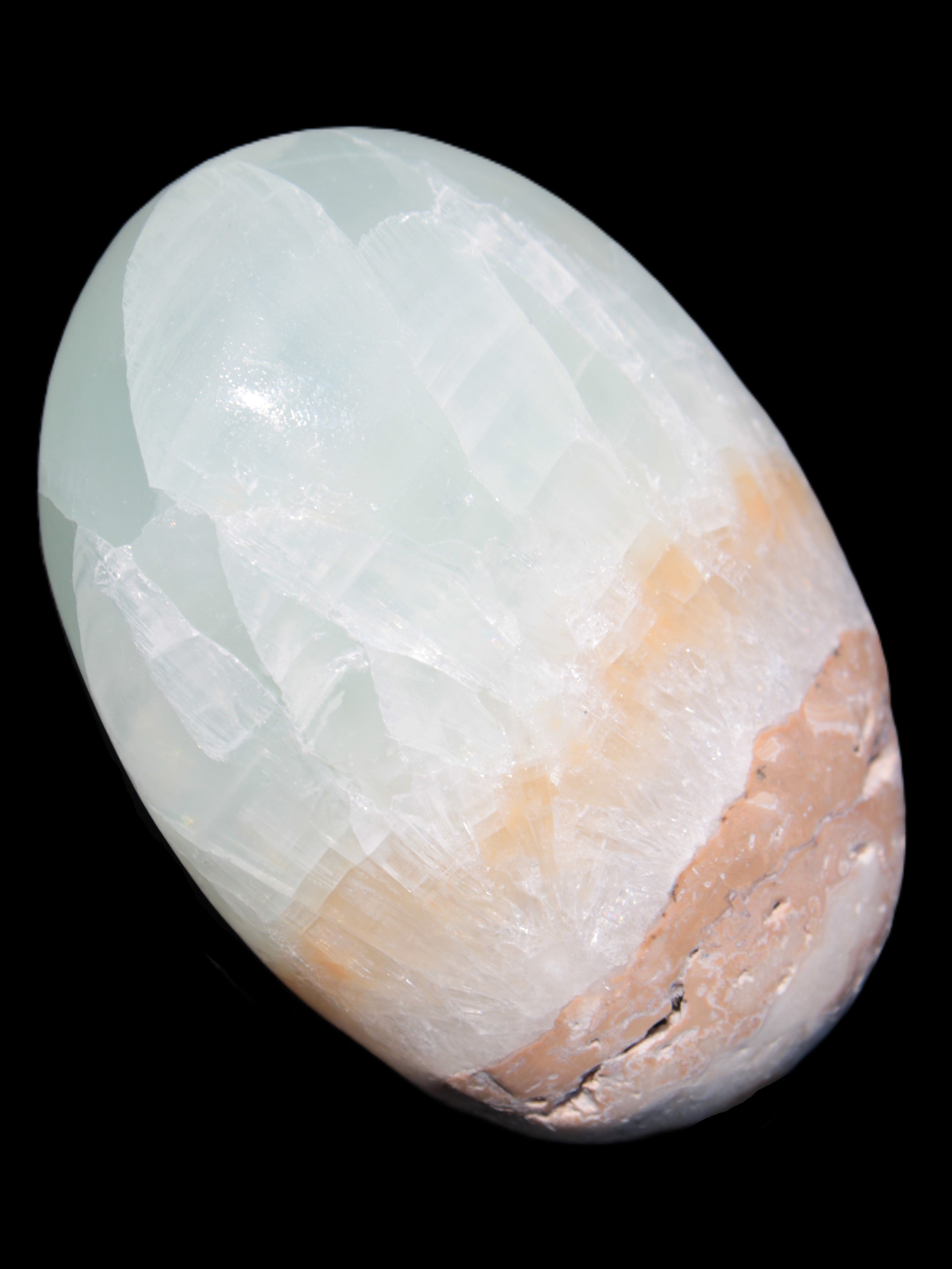 Pistachio Calcite palmstone 64-72mm  121-168g in sunshine - Rocks and Things Store