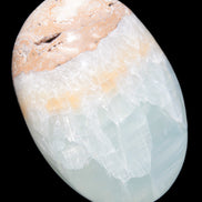 Pistachio Calcite palmstone 64-72mm  121-168g in sunshine - Rocks and Things Store