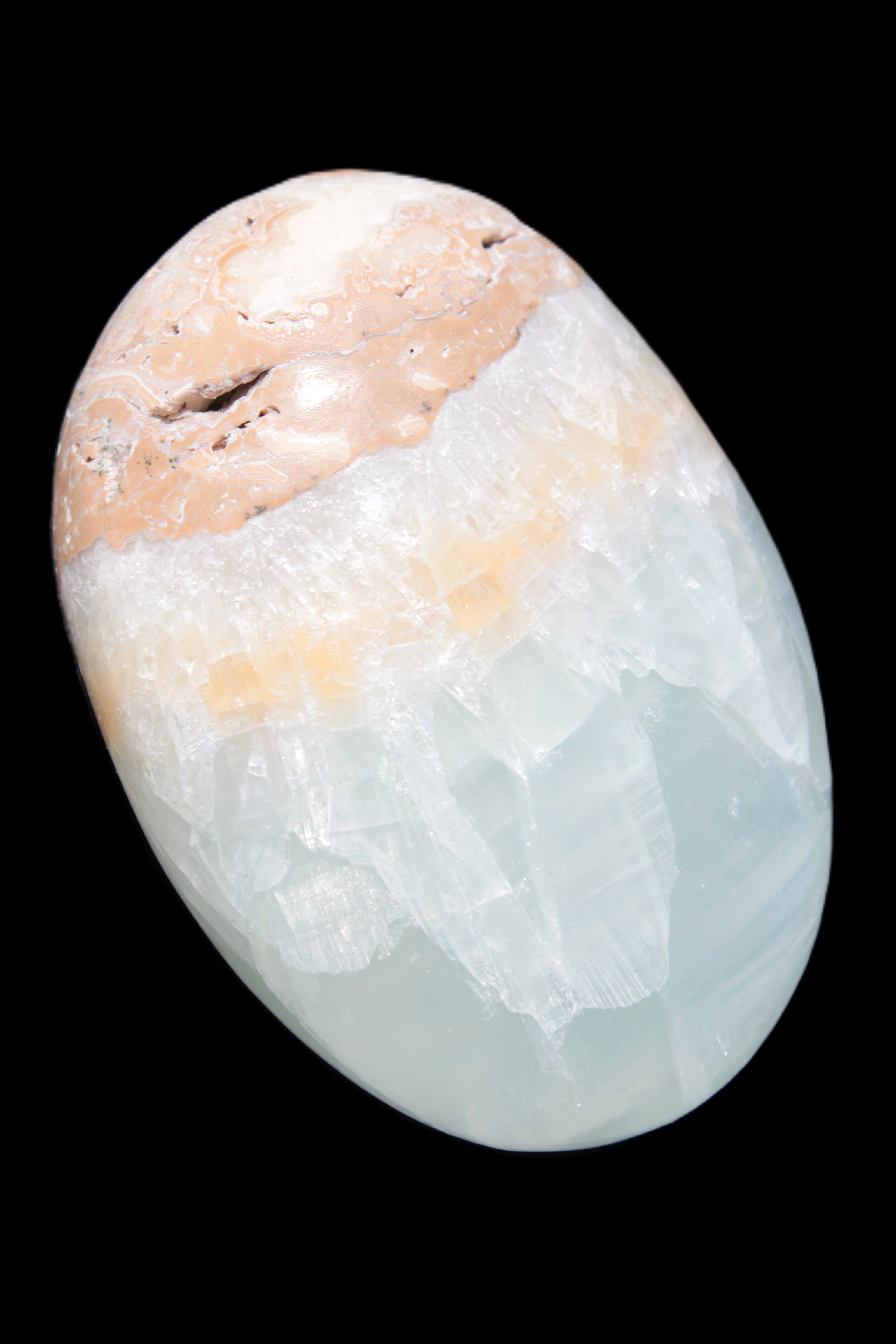 Pistachio Calcite palmstone 64-72mm  121-168g in sunshine - Rocks and Things Store