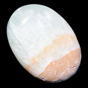 Pistachio Calcite palmstone 64-72mm  121-168g in sunshine - Rocks and Things Store