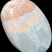 Pistachio Calcite palmstone 64-72mm  121-168g in sunshine - Rocks and Things Store