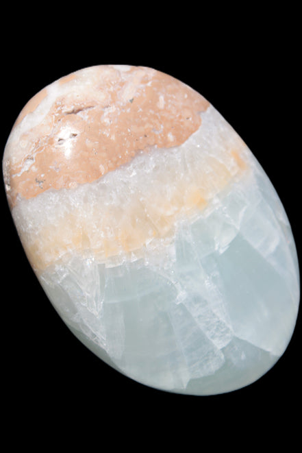 Pistachio Calcite palmstone 64-72mm  121-168g in sunshine - Rocks and Things Store