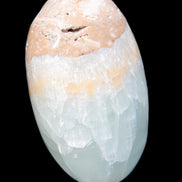 Pistachio Calcite palmstone 64-72mm  121-168g in sunshine - Rocks and Things Store