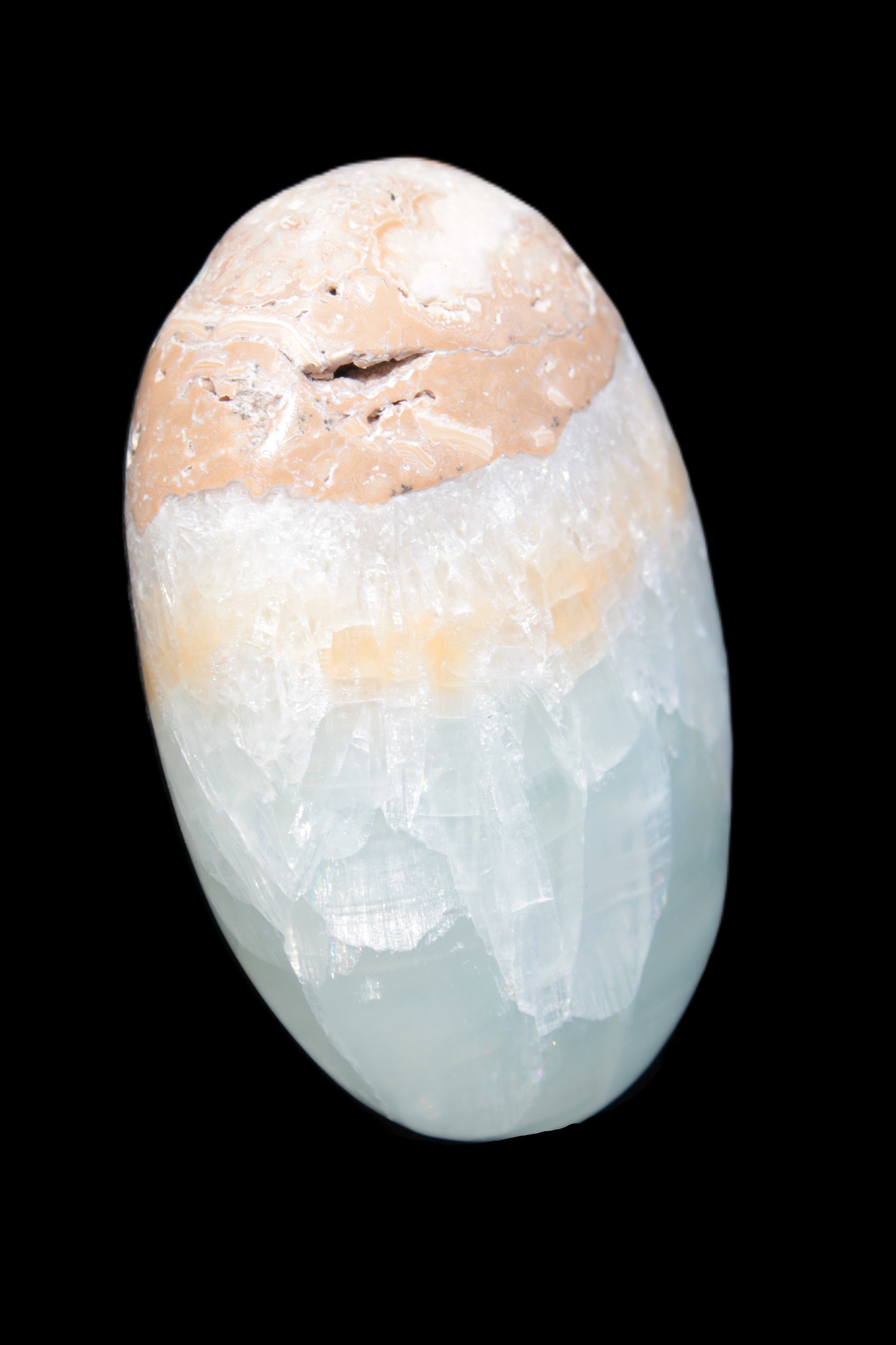 Pistachio Calcite palmstone 64-72mm  121-168g in sunshine - Rocks and Things Store