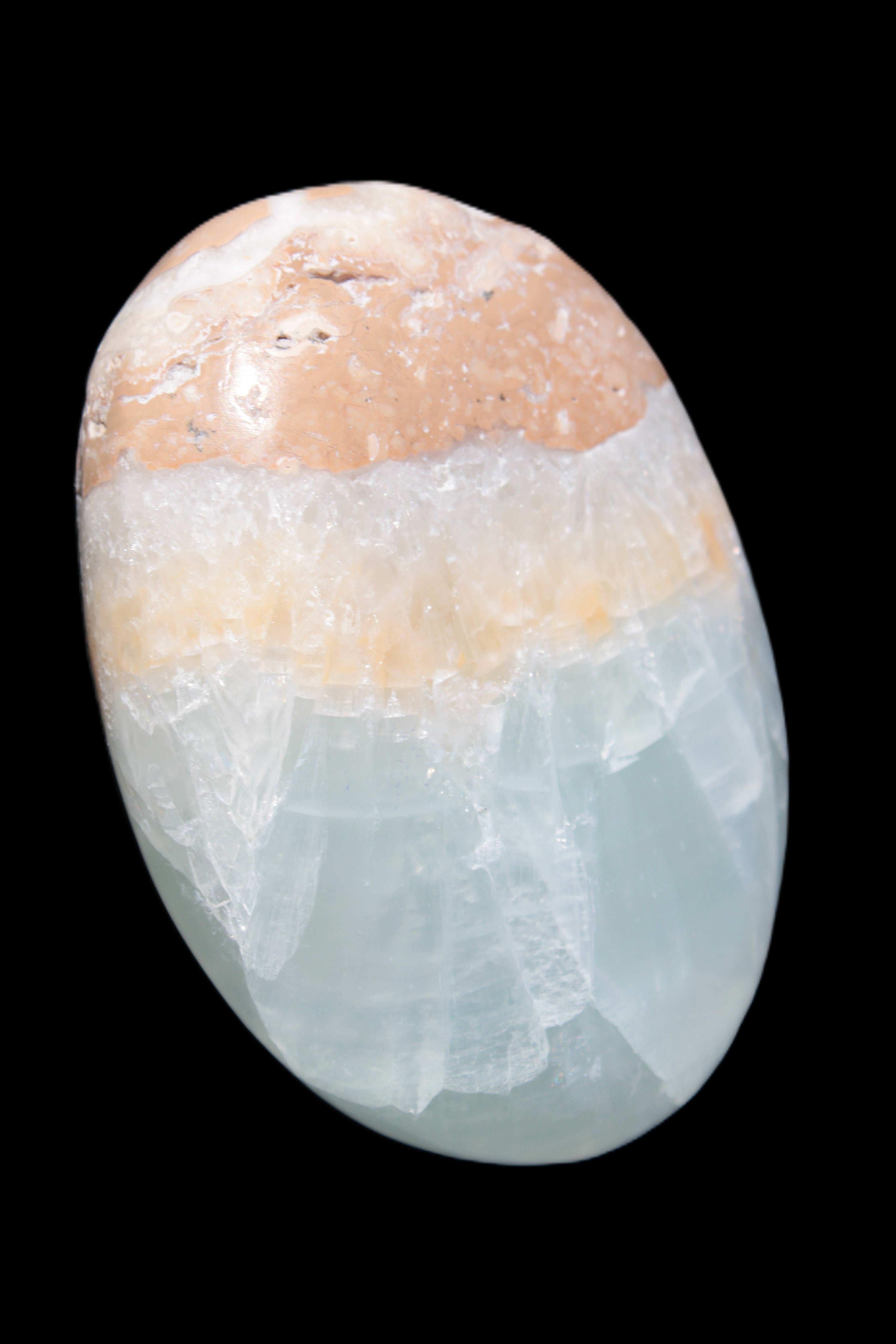 Pistachio Calcite palmstone 64-72mm  121-168g in sunshine - Rocks and Things Store
