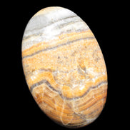 BumbleBee Calcite palm stone 64-70mm 108-130g  in sunlight - Rocks and Things Store