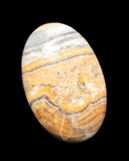 BumbleBee Calcite palm stone 64-70mm 108-130g  in sunlight - Rocks and Things Store