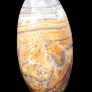 BumbleBee Calcite palm stone 64-70mm 108-130g in sunlight - Rocks and Things Store