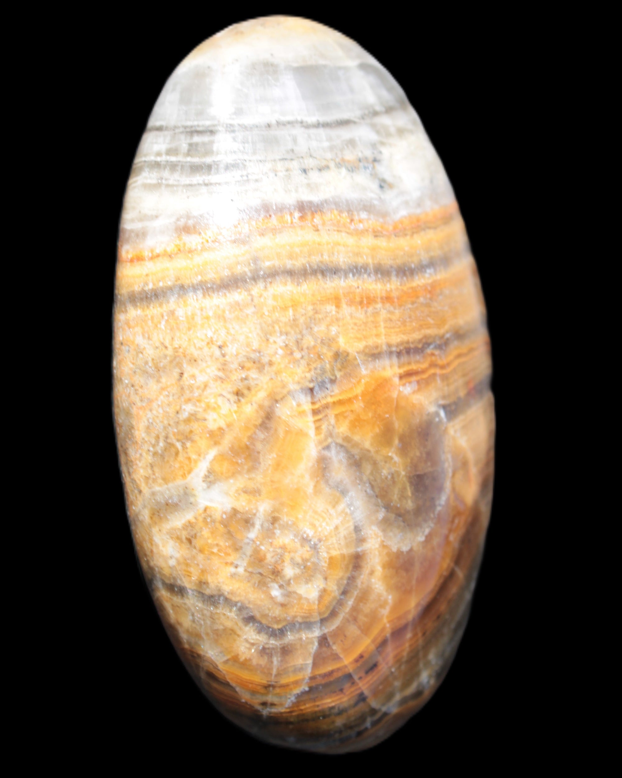BumbleBee Calcite palm stone 64-70mm 108-130g in sunlight - Rocks and Things Store
