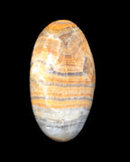 BumbleBee Calcite palm stone 64-70mm 108-130g in sunlight - Rocks and Things Store