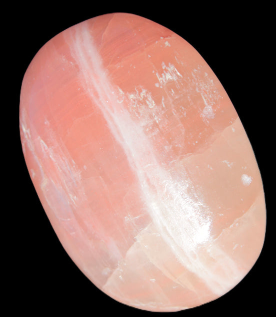 Pink Sorbet Calcite palm stone 57-61mm 71-117g in sunlight - Rocks and Things Store