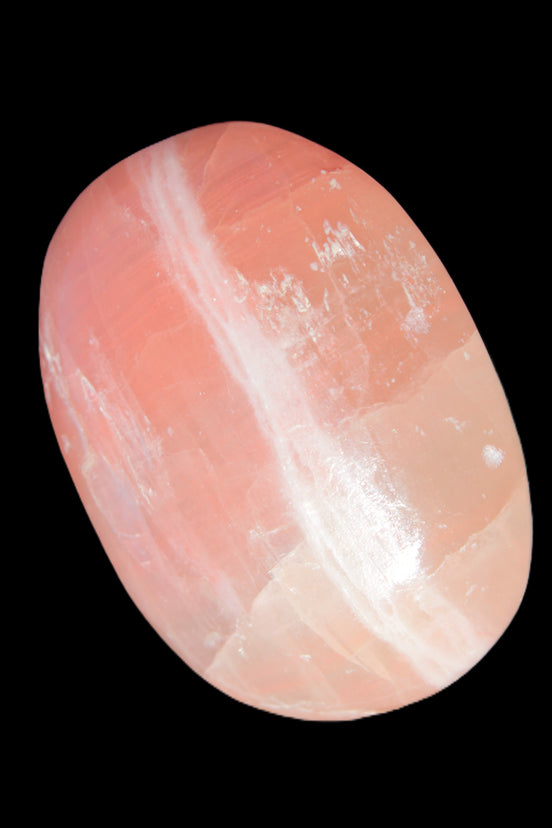 Pink Sorbet Calcite palm stone 57-61mm 71-117g in sunlight - Rocks and Things Store