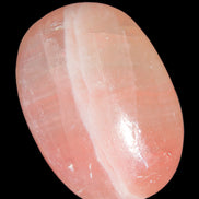 Pink Sorbet Calcite palm stone 57-61mm 71-117g in sunlight - Rocks and Things Store