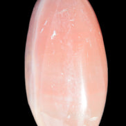 Pink Sorbet Calcite palm stone 57-61mm 71-117g in sunlight - Rocks and Things Store