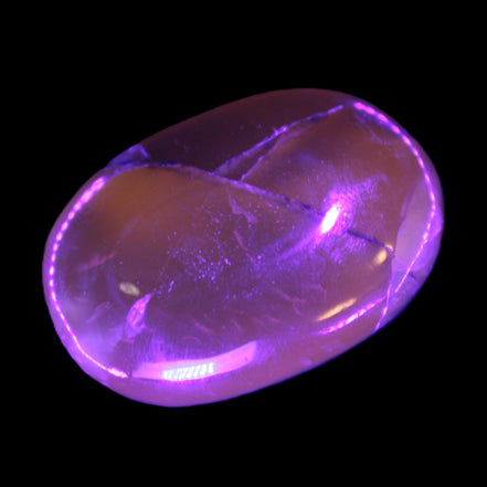 Honey Calcite palm stone 58-62mm 83-95g in UV light - Rocks and Things Store
