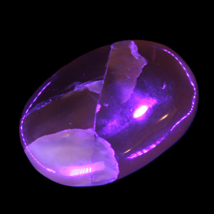 Honey Calcite palm stone 58-62mm 83-95g in UV light - Rocks and Things Store