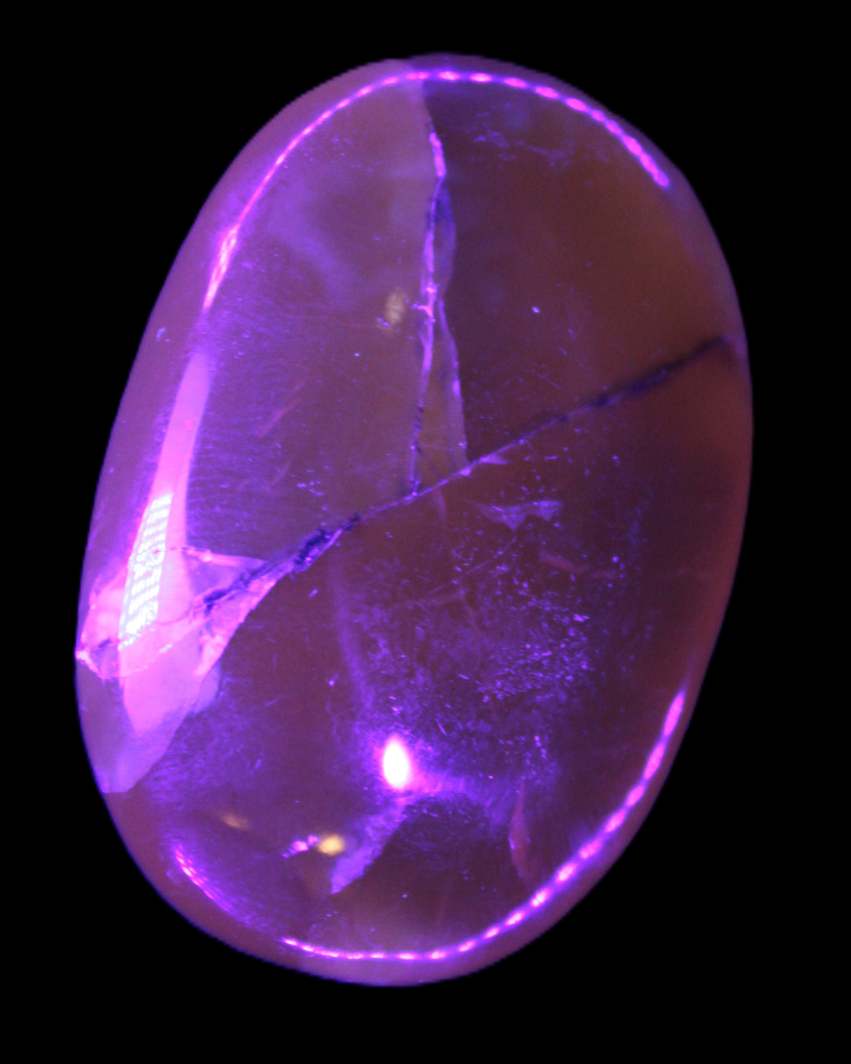 Honey Calcite palm stone 58-62mm 83-95g in UV light - Rocks and Things Store
