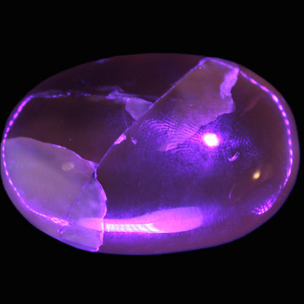 Honey Calcite palm stone 58-62mm 83-95g in UV light - Rocks and Things Store