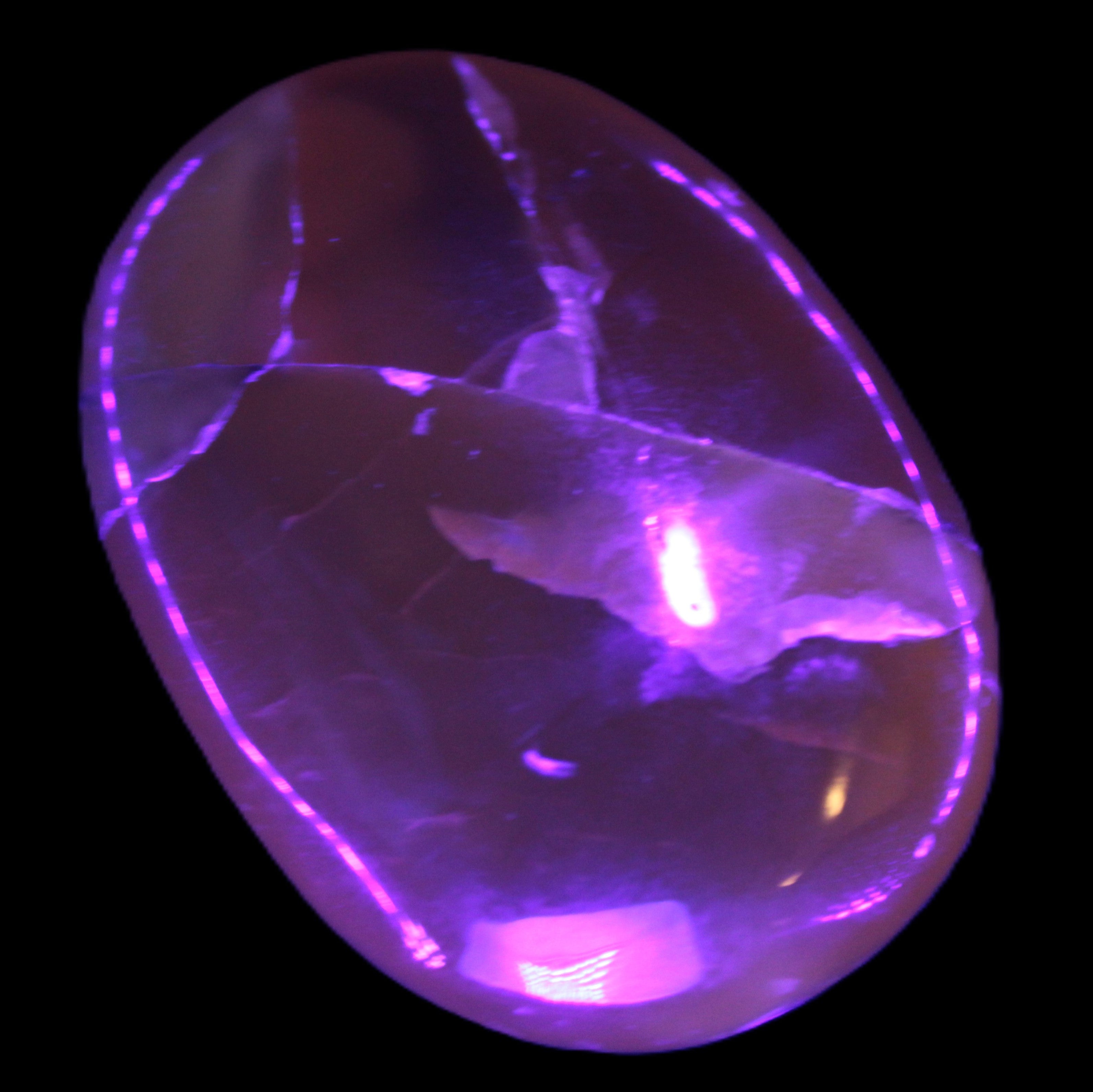 Honey Calcite palm stone 58-62mm 83-95g in UV light - Rocks and Things Store