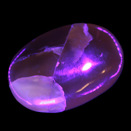 Honey Calcite palm stone 58-62mm 83-95g in UV light - Rocks and Things Store
