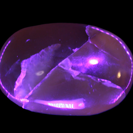 Honey Calcite palm stone 58-62mm 83-95g in UV light - Rocks and Things Store