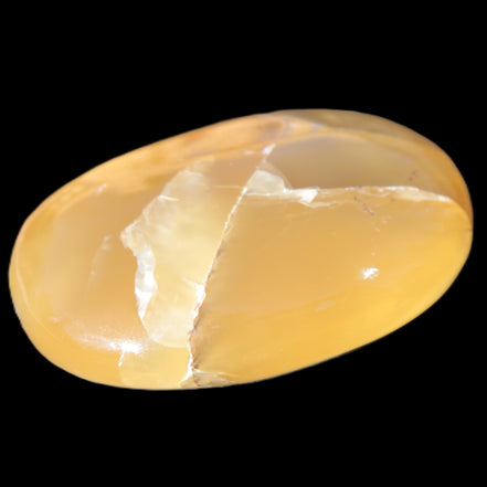 Honey Calcite palm stone 58-62mm 83-95g in sunlight - Rocks and Things Store