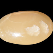 Honey Calcite palm stone 58-62mm 83-95g Rocks and Things