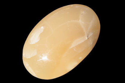 Honey Calcite palm stone 58-62mm 83-95g Rocks and Things