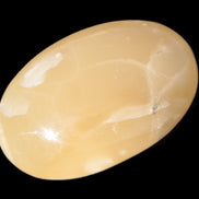 Honey Calcite palm stone 58-62mm 83-95g Rocks and Things